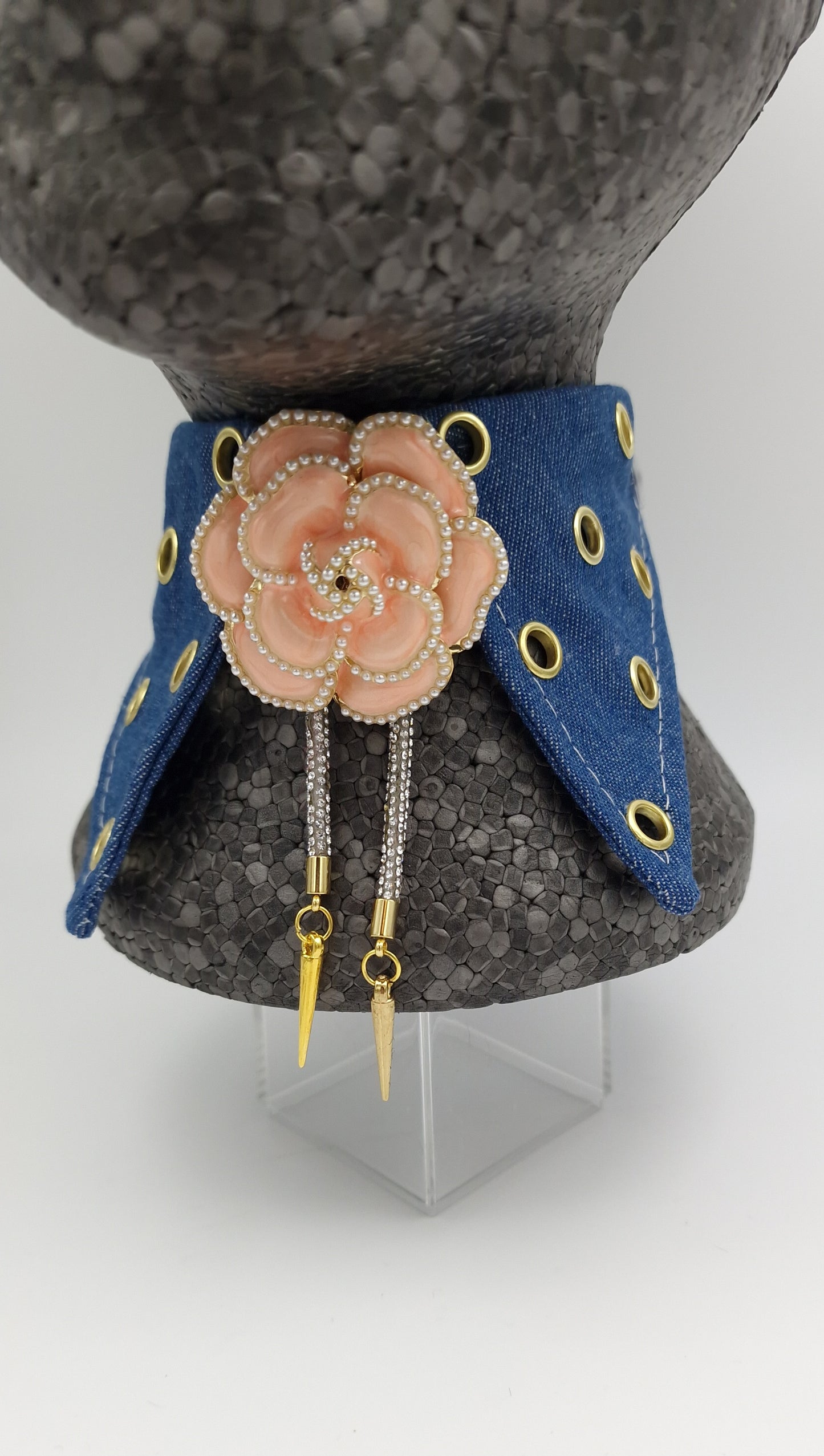 The eyelet denim collar and bolo tie